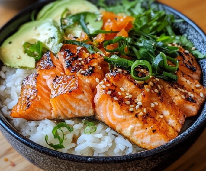 Crispy Salmon and Rice Bowl served with avocado